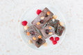 brownie with rasberries and macadamias