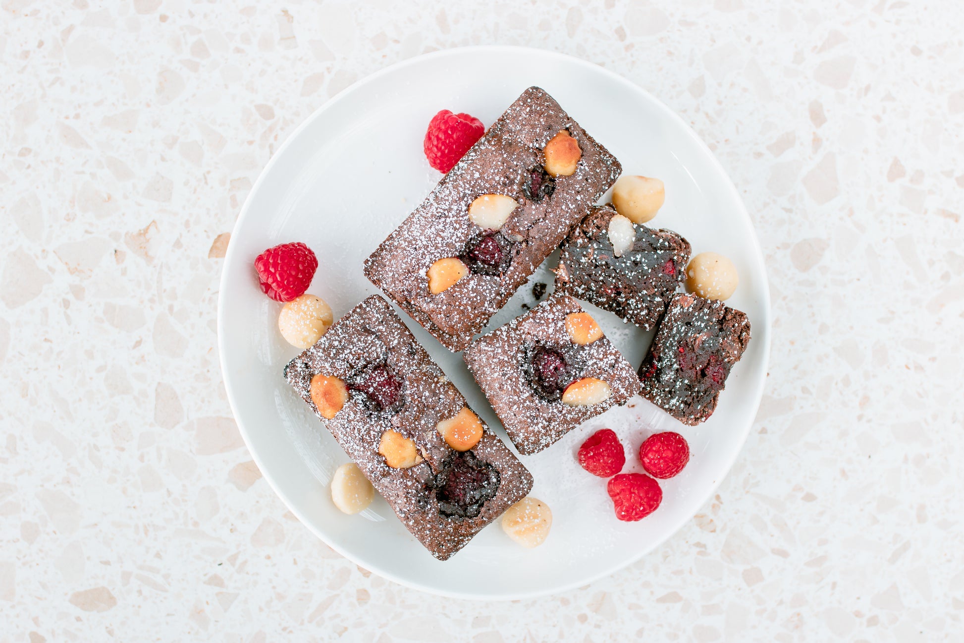 brownie with rasberries and macadamias